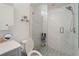 Bathroom features a glass enclosed shower with decorative tiling at 1770 Chinook Trl, Maitland, FL 32751