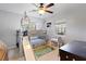 Playful bedroom with a unique bunk bed, slide, and study area creating a fun space at 1770 Chinook Trl, Maitland, FL 32751