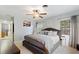 Bedroom with a ceiling fan, and a window for natural light at 1770 Chinook Trl, Maitland, FL 32751