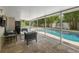Covered Pool Area has chairs and overlooks the Pool at 1770 Chinook Trl, Maitland, FL 32751