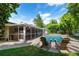 Backyard with a pool, patio, and screened in porch at 1770 Chinook Trl, Maitland, FL 32751