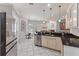 Kitchen with sleek granite countertops, modern stainless steel appliances, and an eat-in area at 1907 Sir Lancelot Cir, St Cloud, FL 34772