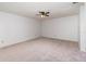 Bedroom featuring neutral carpet, ceiling fan, and ample space at 2003 Bentwood Dr, Winter Park, FL 32792