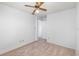 Spacious bedroom with neutral carpet, a ceiling fan, and an attached room at 2003 Bentwood Dr, Winter Park, FL 32792