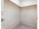 Walk-in closet features copper rods and white wire shelving at 2003 Bentwood Dr, Winter Park, FL 32792