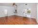 Spacious living room with wood-look floors and a ceiling fan at 2003 Bentwood Dr, Winter Park, FL 32792