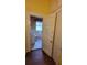 Bathroom view includes toilet, sink, tiled floor and walls, and a window at 206 N Highland Ave, Winter Garden, FL 34787