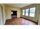 Dining room featuring hardwood floors, natural light from the windows, and yellow painted walls at 206 N Highland Ave, Winter Garden, FL 34787