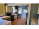Efficient kitchen featuring retro cabinets, appliances, and a cozy design at 206 N Highland Ave, Winter Garden, FL 34787