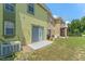 Exterior backyard with a patio at 214 Monroe Cir, Davenport, FL 33896
