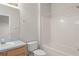 Bathroom with sink vanity, toilet, and tub with shower head at 214 Monroe Cir, Davenport, FL 33896