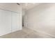 Bedroom with carpet, closet, and bright white trim at 214 Monroe Cir, Davenport, FL 33896