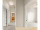 Hallway with bathroom and open view to a separate room at 214 Monroe Cir, Davenport, FL 33896