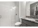 Modern bathroom features glass enclosed shower, granite countertop vanity, and updated fixtures at 2340 Standing Rock Cir, Oakland, FL 34787