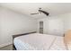 Cozy bedroom with neutral walls, fan, and a double door closet at 2340 Standing Rock Cir, Oakland, FL 34787