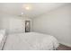 Bright bedroom boasts neutral walls, wood floors, and closet space at 2340 Standing Rock Cir, Oakland, FL 34787