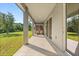 Covered patio with stylish outdoor furniture, perfect for relaxing and entertaining guests at 2340 Standing Rock Cir, Oakland, FL 34787