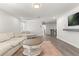 Bright living room featuring hardwood floors, recessed lighting, and comfortable seating arrangements at 2340 Standing Rock Cir, Oakland, FL 34787