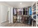 Large walk-in closet with custom organizers and shelving to maximize storage at 2340 Standing Rock Cir, Oakland, FL 34787