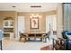 Dining area features modern lighting, tile floors, and plenty of natural light at 2357 Alaqua Dr, Longwood, FL 32779