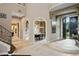 Elegant foyer features tile flooring, arched entryways, and a grand staircase at 2357 Alaqua Dr, Longwood, FL 32779