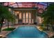 Beautiful pool and patio area, great for entertaining with tropical landscape at 2357 Alaqua Dr, Longwood, FL 32779