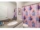 themed bathroom featuring a shower with a Frozen-themed shower curtain at 3004 Protagonist St, Kissimmee, FL 34746
