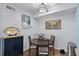 A cozy dining room with a round table, perfect for intimate meals and gatherings at 3028 Parkway Blvd # 308, Kissimmee, FL 34747