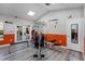 Gym with fitness equipment including a weight machine, weight bench, and a mirrored wall at 3028 Parkway Blvd # 308, Kissimmee, FL 34747