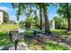Beautiful lakeside picnic area with a fountain, providing a relaxing outdoor space for residents at 3028 Parkway Blvd # 308, Kissimmee, FL 34747