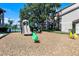 Community playground with a slide, spring rider, and mulch ground cover near the residences at 3028 Parkway Blvd # 308, Kissimmee, FL 34747