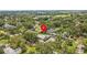 Charming home nestled among lush trees, community, and landscaping in a desirable neighborhood at 310 E Gulley Ave, Oakland, FL 34760