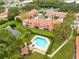 Aerial view of the community with a pool and a pond at 3336 Gray Fox Cv # 3336, Apopka, FL 32703