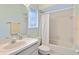 Bright bathroom featuring neutral walls and a shower with white tiling at 3336 Gray Fox Cv # 3336, Apopka, FL 32703