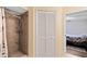 Bathroom featuring a walk-in shower with a tile surround at 3336 Gray Fox Cv # 3336, Apopka, FL 32703
