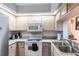Functional kitchen featuring modern appliances, ample counter space, and plenty of storage at 3336 Gray Fox Cv # 3336, Apopka, FL 32703