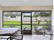 View from the lanai to the exterior fence and landscaping at 3336 Gray Fox Cv # 3336, Apopka, FL 32703