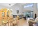 Open concept living space with lots of natural light and vaulted ceilings at 3336 Gray Fox Cv # 3336, Apopka, FL 32703