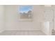 Neutral room with large window, tile flooring, and natural light at 4178 Sw 43Rd Cir, Ocala, FL 34474