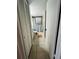 Long bathroom with shower-tub combo featuring tile floors and a curtain at 4364 White Pine Ave # 3, Orlando, FL 32811