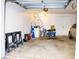 Spacious garage with storage and a single overhead lightbulb at 4364 White Pine Ave # 3, Orlando, FL 32811