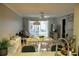 Open concept living and dining area with lots of natural light and views of the patio at 4364 White Pine Ave # 3, Orlando, FL 32811