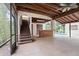 Large patio with bar area offers access to the home and backyard pool at 4420 Conway Gardens Rd, Orlando, FL 32806