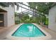 Relax by the refreshing pool in a screened enclosure, perfect for enjoying sunny days in peace at 4420 Conway Gardens Rd, Orlando, FL 32806