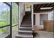 Outdoor stairs offer access to the upper level of this charming home at 4420 Conway Gardens Rd, Orlando, FL 32806