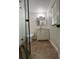 Modern bathroom with glass shower, vanity with a sink, and mirror at 470 Sunset Rd, Deltona, FL 32725
