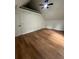 Bedroom features hardwood floors, vaulted ceiling, ceiling fan and dormer areas at 470 Sunset Rd, Deltona, FL 32725