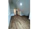 Bedroom features hardwood floors and neutral walls, plus a small dormer area at 470 Sunset Rd, Deltona, FL 32725