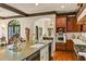 Gourmet kitchen island, stainless steel appliances, and custom cabinets at 522 Cherokee Dr, Orlando, FL 32801