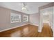 Bedroom with wood floors and view to the hall way at 663 Romano Ave, Orlando, FL 32807